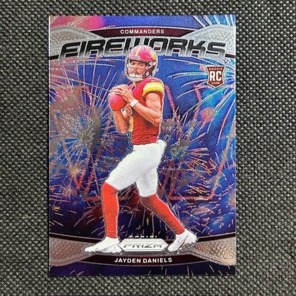 2024 Panini Prizm - Fireworks Jayden Daniels #24 (RC) Rookie Commanders - Picture 1 of 2